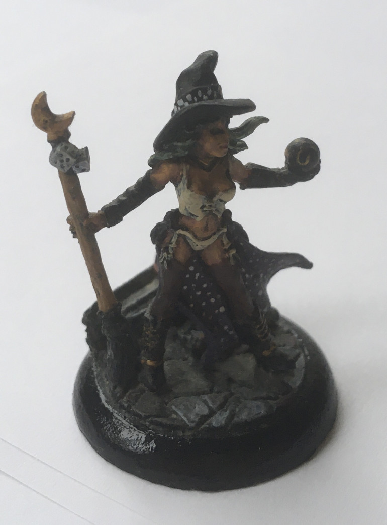 The Friendly Witch and her cuddly familiar. This is actually a Reaper Miniatures Chronoscope heroine but is suitably fantasy-like to include in this collection. 