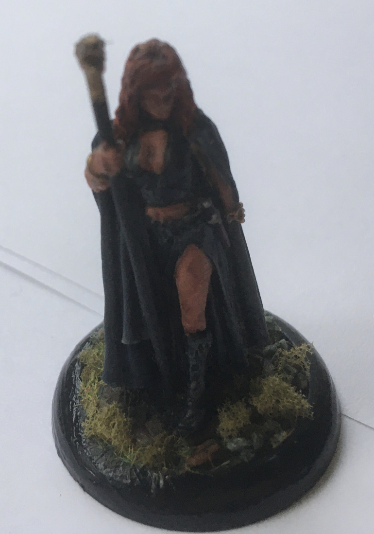 The Sorceress - black leather robes, black leather clothes, black leather boots… is that a clue to her potential alignment?