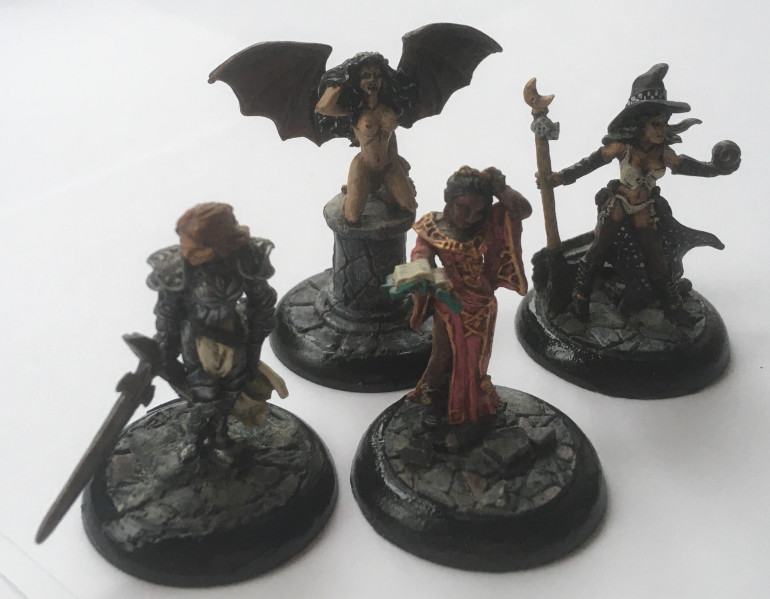 If you pop down a nearby dungeon, then perhaps you will encounter this friendly witch along with her paladin  and cleric companions? Models chosen Reaper Miniatures SKU 50128 Krissy, Modern Witch sculpted by Bob Ridolfi; Reaper Miniatures SKU 02725  Human Paladin, Alaine sculpted by Werner Klocke; Reaper Miniatures SKU 02825 Human Wizard, Jolie sculpted by Werner Klocke. Now if your luck is out your adventurers may encounter this succubus instead! Model chosen Reaper Miniatures SKU 02098 Lillith the Succubus sculpted by Bob Ridolfi. Again, painted in my grim-dark, gothic fashion with the use of Fenris(?) 30mm lipped bases. 