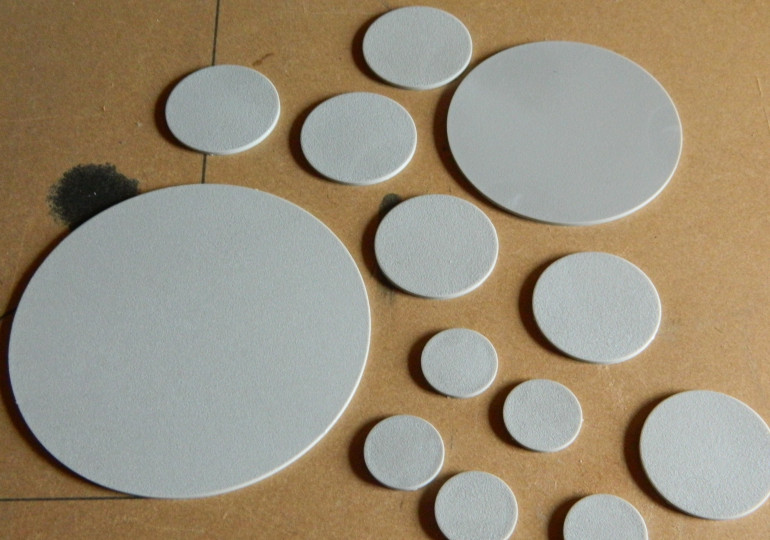 Plastic inserts: KD bases are a two-part deal. Except Monster included optional scenic inserts with the iconic stone faces. This means a leftover pile of flat plastic 27mm discs...