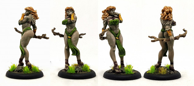 Wood Elf Pin-Up 1, 3D print from Ghamak.  Another example of a paint job that looks great at 6 inches, but the camera makes it look like a blotchy mess :(