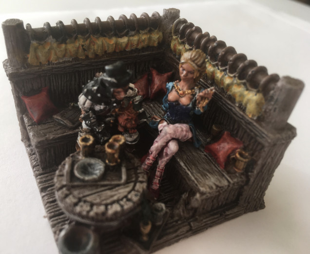 In the snug we have Dunkeldorf Miniatures - Bertha and Bull (the cat) conspiring with Mischa the Courtesan. Perhaps they will prey on the mercenary trio once they have consumed enough liquor and enjoyed sufficient food to ensure that a nap is in order? 