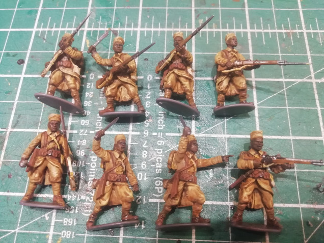 The kit has some good options for doing some french colonial troops. I've put a squad of eight together for my force swinging their machetes about