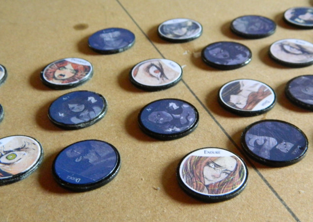 Player activation and Survival action tokens. 