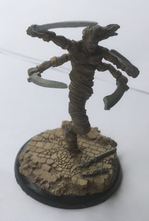 The Dust Devil - with four arms and four swords, he comes in pretty handy should you annoy the Vizier… Painted to match the sandy base as if he was conjured direct from the ground.