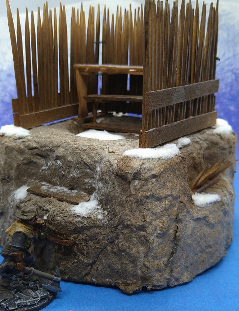 I used Model Mates Mud Brown to correct bits missed by the spray paint or to add depth to the colour. Anything that didn't look quite right was hit with snow flock.