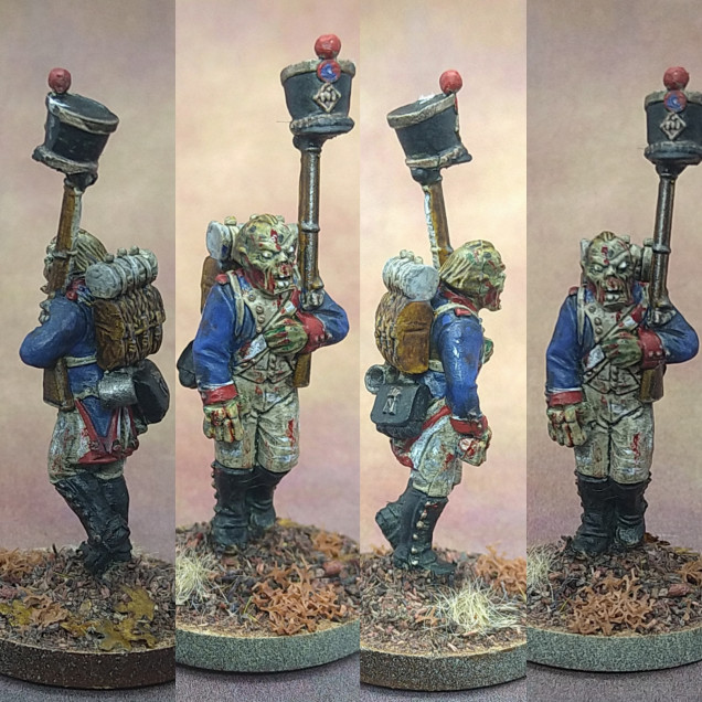 Another French zombie. Slightly more jokey with the shako on his musket.  I won't mistake him for a French regular I guess. The Mantic zombie head is gross enough and the skeletal hand is horrific enough to blend in with the rest.