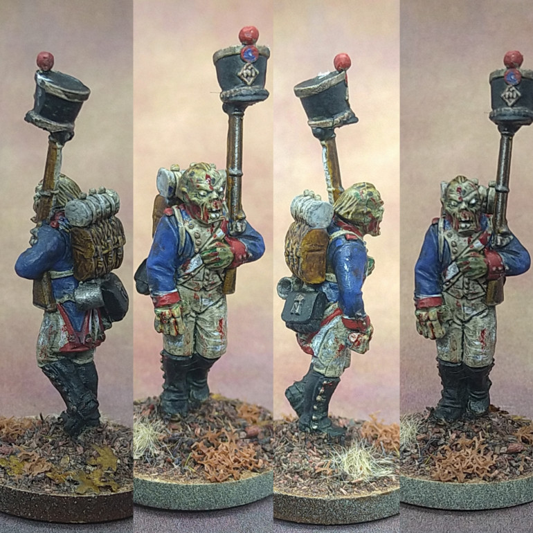 Another French zombie. Slightly more jokey with the shako on his musket. I won't mistake him for a French regular I guess. The Mantic zombie head is gross enough and the skeletal hand is horrific enough to blend in with the rest.