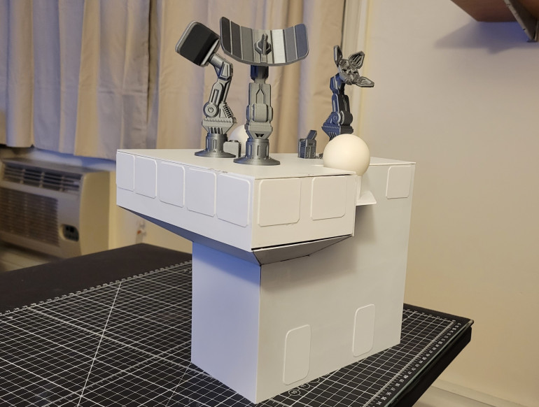 Superstructure built. Shown is the unpainted result, with some 3d printed radar. Yes, those are ping pong balls ;P