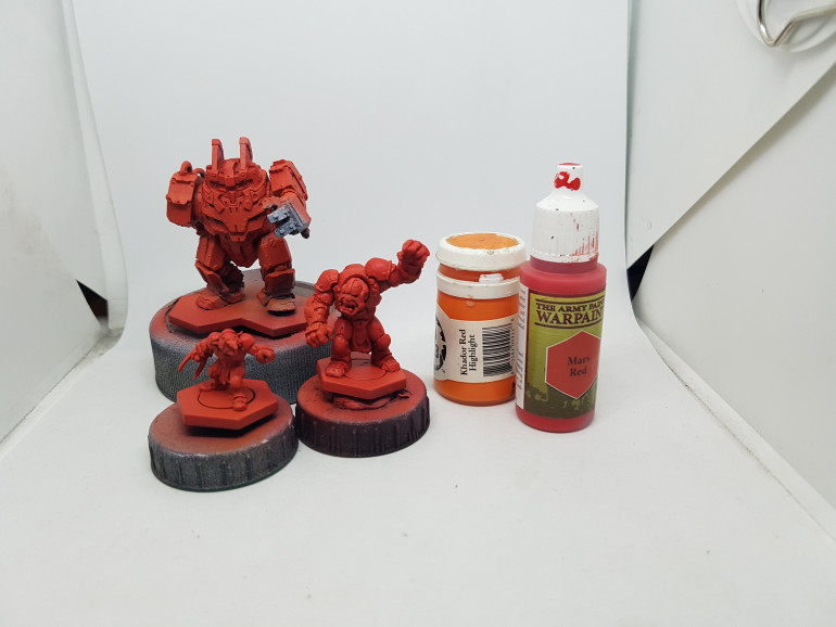 Based with AP Mars Red, then highlighted with a mix of Mars Red and P3 Khador Red Highlight.