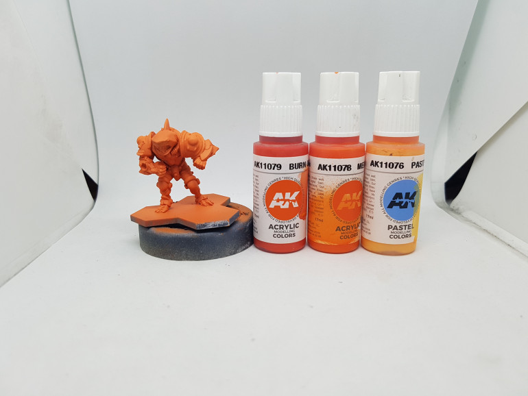 Even base coat of AK11079 Burn orange, then side and downward coats of AK11078 Medium Orange.  Some AK11076 Pastel Peach was added to the previous colour and used as a highlight