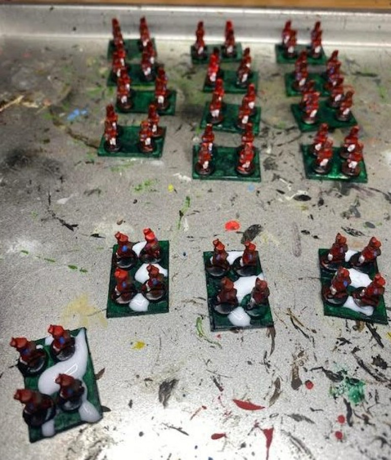 I mounted the infantry and PVA glue spread to prepare for the basing.