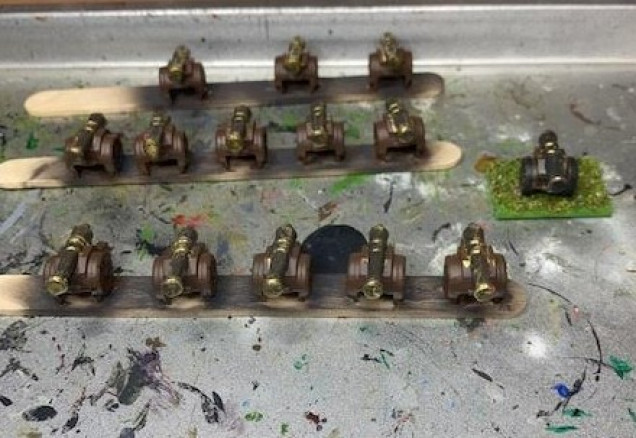 I used bronze for the cannons and oak brown for the wood.  These dried and prepared for basing next.