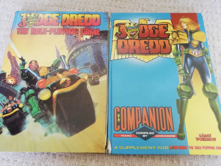 Way back in 1987 I walked into my local games workshop and picked up the judge Dredd companion. I was 11 years old and had no idea what an rpg was but I knew who judge dredd was so I picked up the book to read. I remember the shop assistant telling me it wasn't a full game probably realising I had no idea what I was buying. He was right but I didn't care I enjoyed the source book and still have it. I got the core rules many years later 