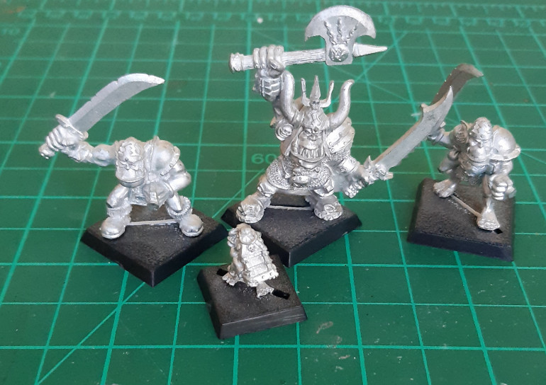 Four orcs from the Lair of the Orc Lord expansion. Well, three orcs and a snotling anyway.