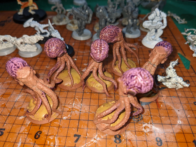 Yeah, started on the Tanglers tonight (Bombshell Minis Edo Edolisks without wings on normal bases). Desert Yellow on the bases, and Pixie Pink on the suckers and brains, with a Purple Tone wash. I like where this is going.