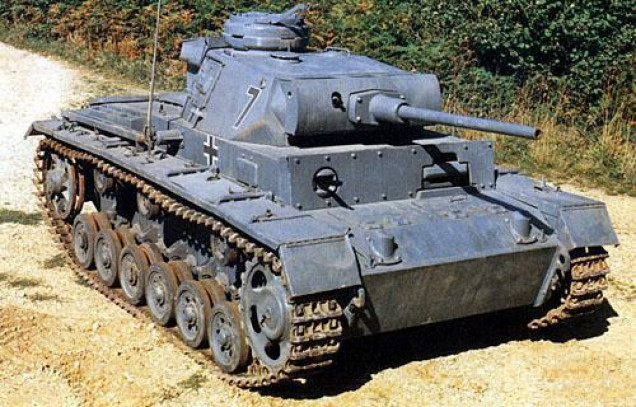 Early war tanks were dark grey, which stands out quite nicely against sandy colours