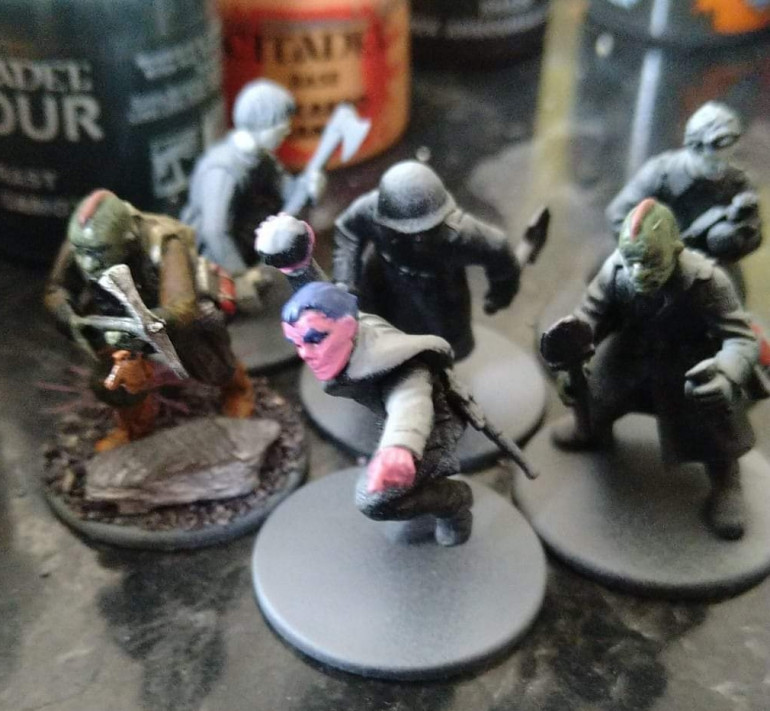 The pink-faced guy mostly Bolt Action Russian but the head is from a Stargrave Crew sprue and the right stone throwing arm is from a Wargames Atlantic Dark Age Irish sprue.