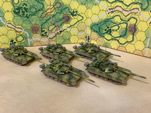 T-80s at their current stage.  Next is sharpen-up adjustments on the camo scheme, dark wash (to tone down these bright, high-contrast colors), some LIGHT highlights, and finally smaller details.