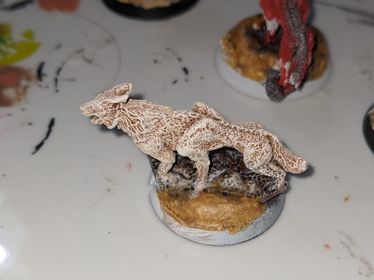 Didn't sleep at all last night so was exhausted. Did some base work, and messed around with a white wolf. Not sure about this. Maybe with a blue tone wash? 