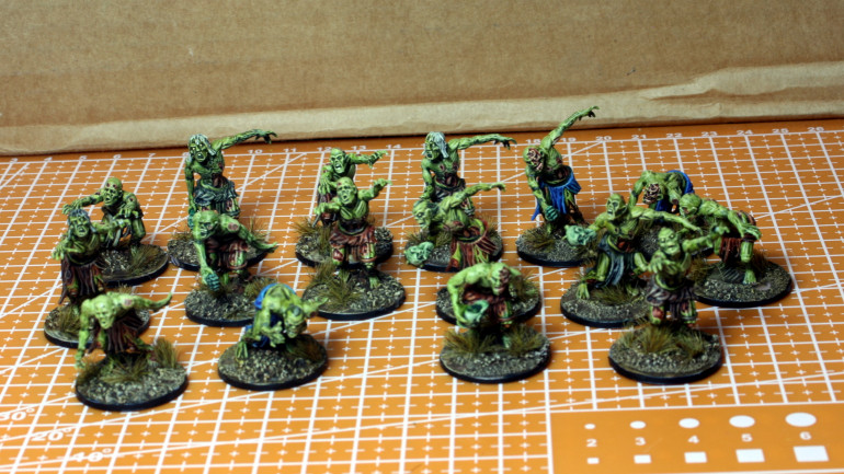 Mantic Zombies.  I mixed Speed paint green and yellow (1:3) for the skin.