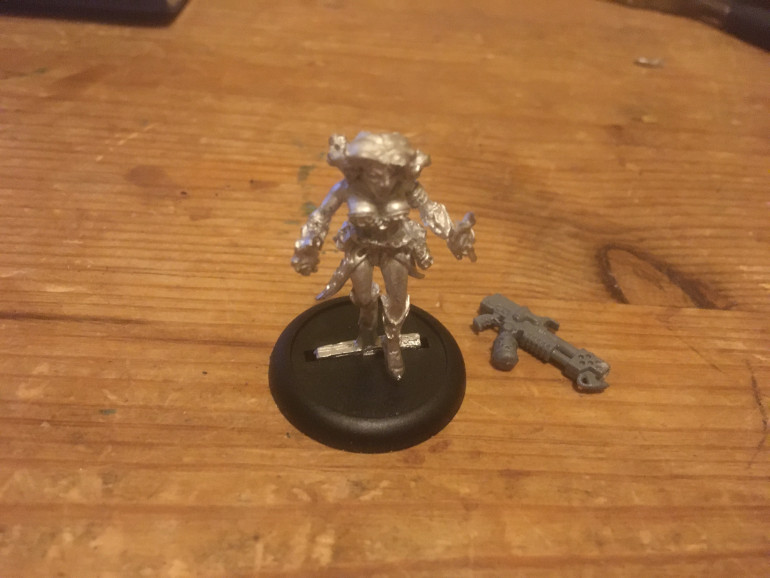 Actually, when sifting through the box of shame… I came across a fire Elementalist and thought if I add a GW space marine flame thrower to her back, she could be a Psionic First Mate? 