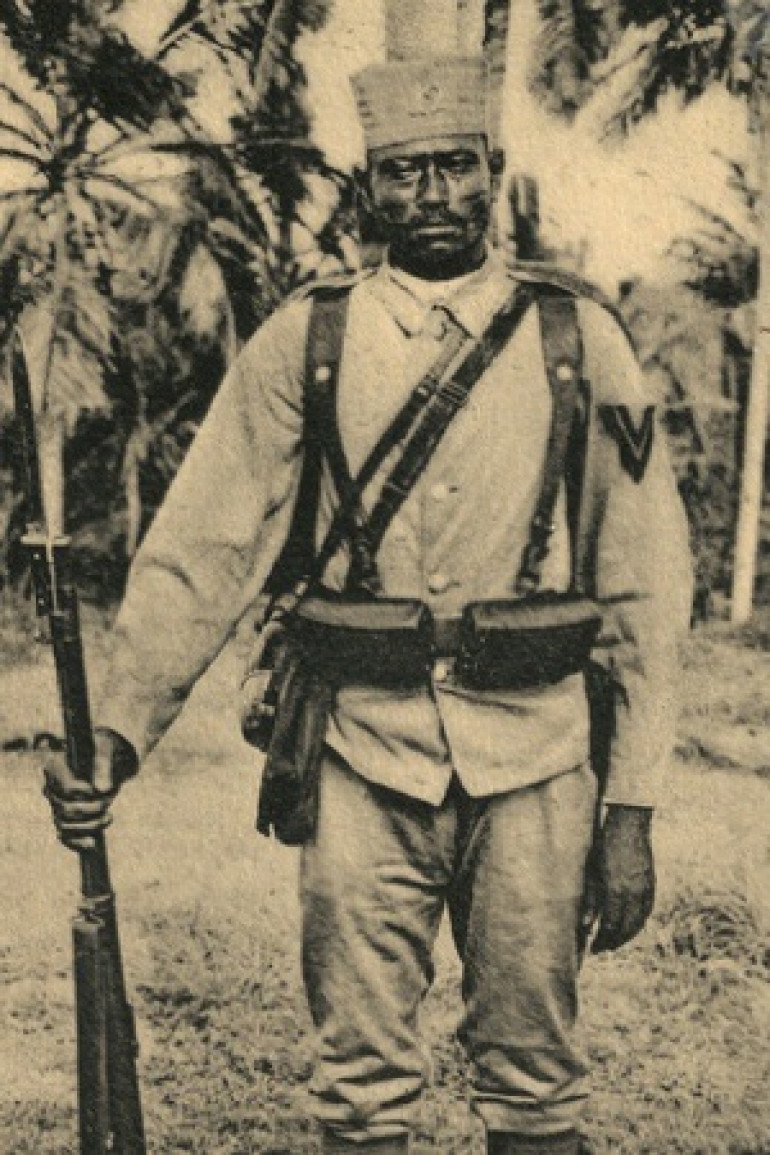 Wearing a similar khaki uniform the Askari headdress was the main difference in appearance. The hat had a built in neck flap. 