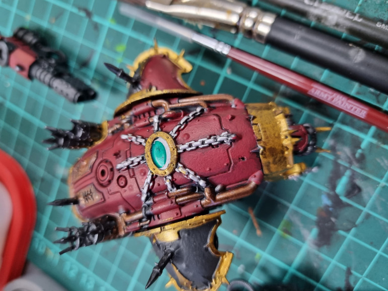 Added the Vallejo Brass, then some how, the red aromour went through lighter stages of the red/black mix before finally pure Khorne Red on the highest area, the silver on the chains and Jade Green Candy Ink on the hatch eye....   Just like magic yeah?