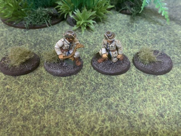 Crew figures and terrain caps. 