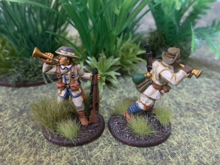 A Pulp Figure on the left and a Brigade Games figure on the right, either one of them could replace a rifleman in the command squad. 