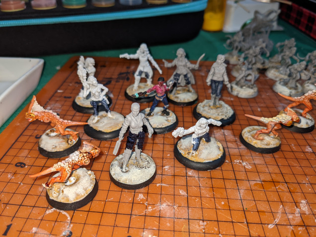 Finished the eyes of the lizardmen Primitives, and painted jeans on my Ruffian ladies. Dunno the rest of the colors, but decided to use blue jeans as a unifying element.