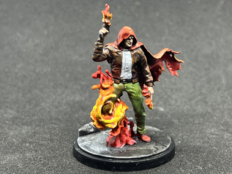 Volutes were painted using Citadel contrast red, orange and yellow and wet blending them on the spot. Some reflection was added to the clothe and skin