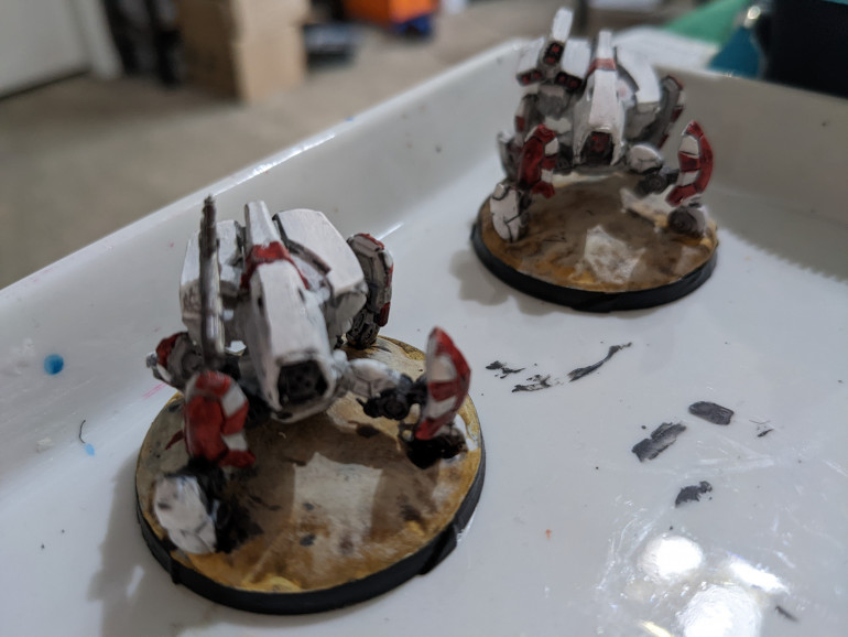 Some little details, the bases, and a second white coat of paint on the high spots and the Warbots are done. Just the Pirates to go. I seem likely to actually finish this project.