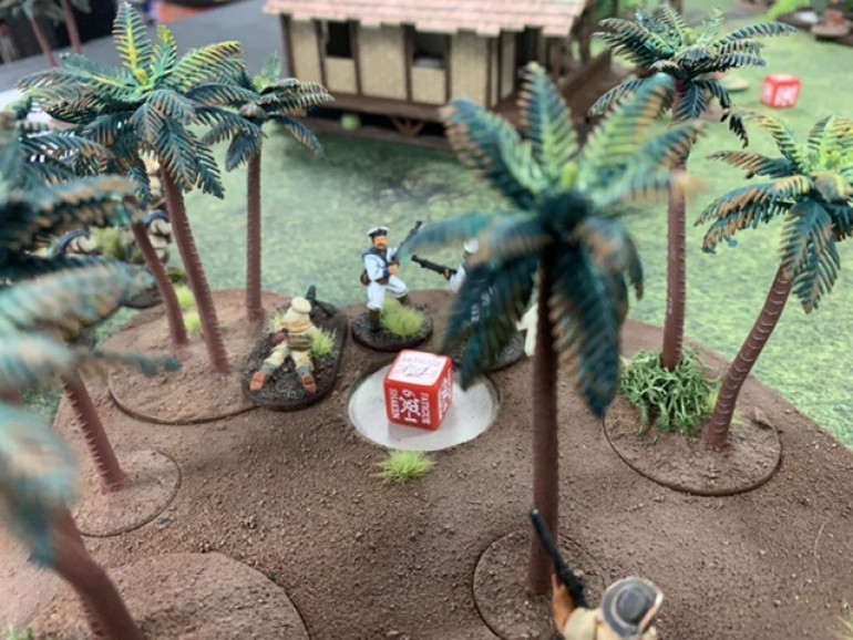 The sniper lends a few shots and manages to add fatigue to the advancing Americans. Meanwhile an Askari squad legs it to the termite mound.