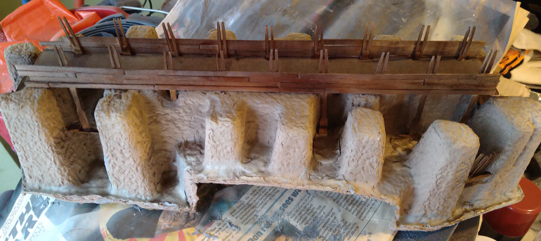 The sides have been built up with coffee stirrers. I think they're at a good level, but If I build it up a bit more it will probably just be at the ends. 