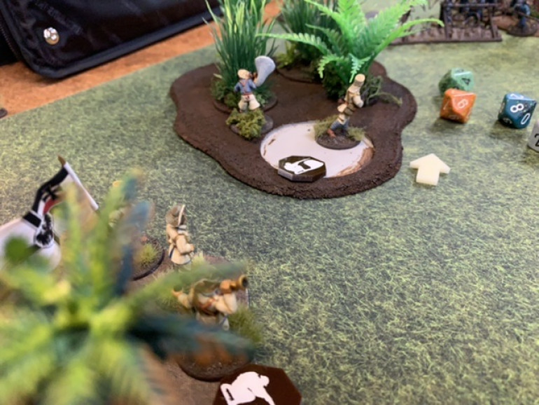 Constant pounding by two French squads and an HMG has caused the naval squad to rout leaving a lone Askari in place. He sheds all his fatigue and is still in the fight! 