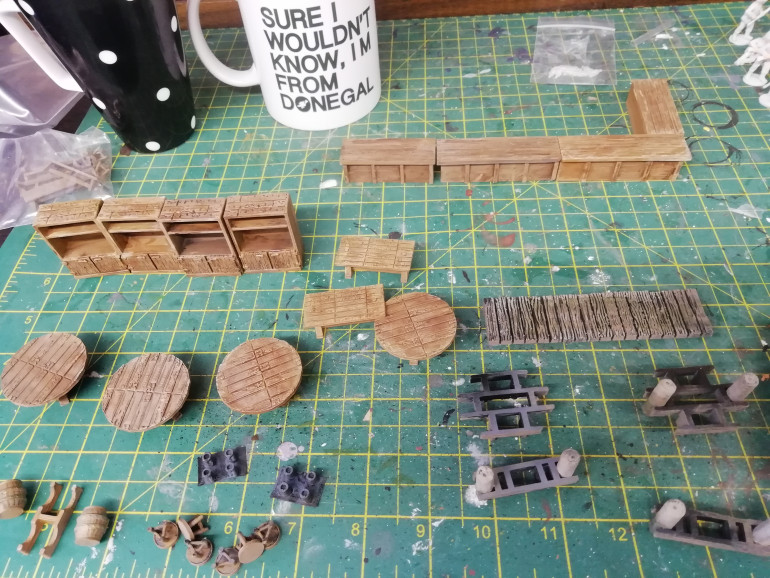 I picked up some more iron gate scenery pieces so I have enough for the tavern brawl scenario. This includes individual bottles to smash over people's heads.