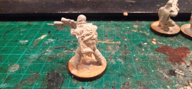 I haven't finished them all yet, here's a sniper, cloak made from wet toilet paper coated in PVA. More on them later.