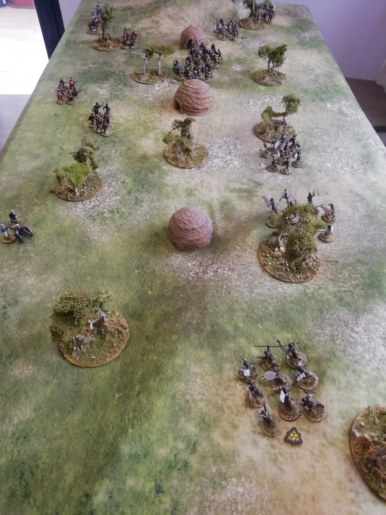 The bulk of the Zulu impi strikes on their right horn chasing the fleeing horse and facing the naval brigade.  On the British right a gatling gun rattles into life but only causing one casualty 