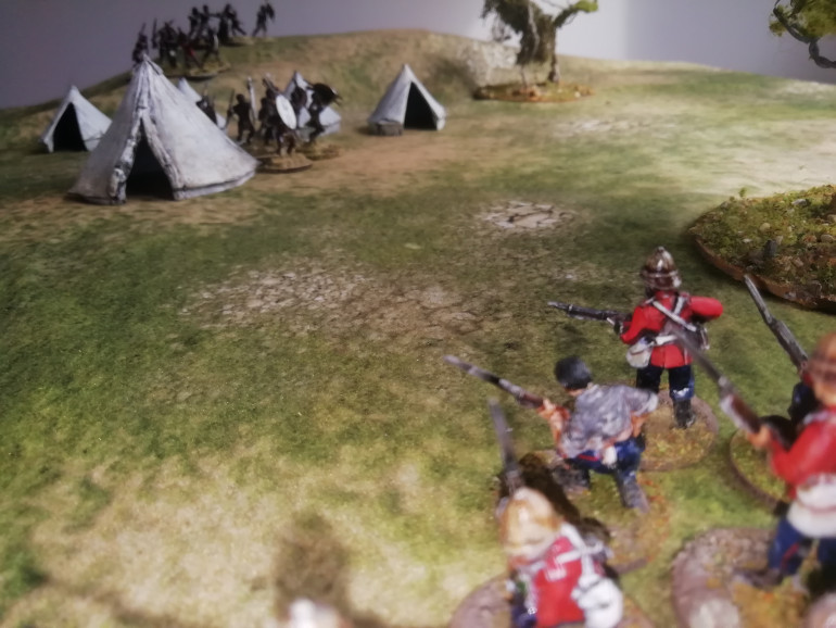 The zulus taunt the British from their own camp but are unable to get near the redcoats thanks to defensive fire. Meanwhile the cavalry is brought down and overrun but gives the British a better field of fire. 