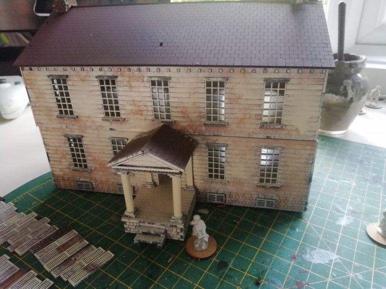 I wanted a larger building to fight in and around after reading about Chew house at German Town. This kit was from Charlie foxtrot models. It comes with no instructions and I think it was missing a roof support but I like the pillars for the porch. I blasted it with a primer but I like the wood showing giving it a natural weathered look. 