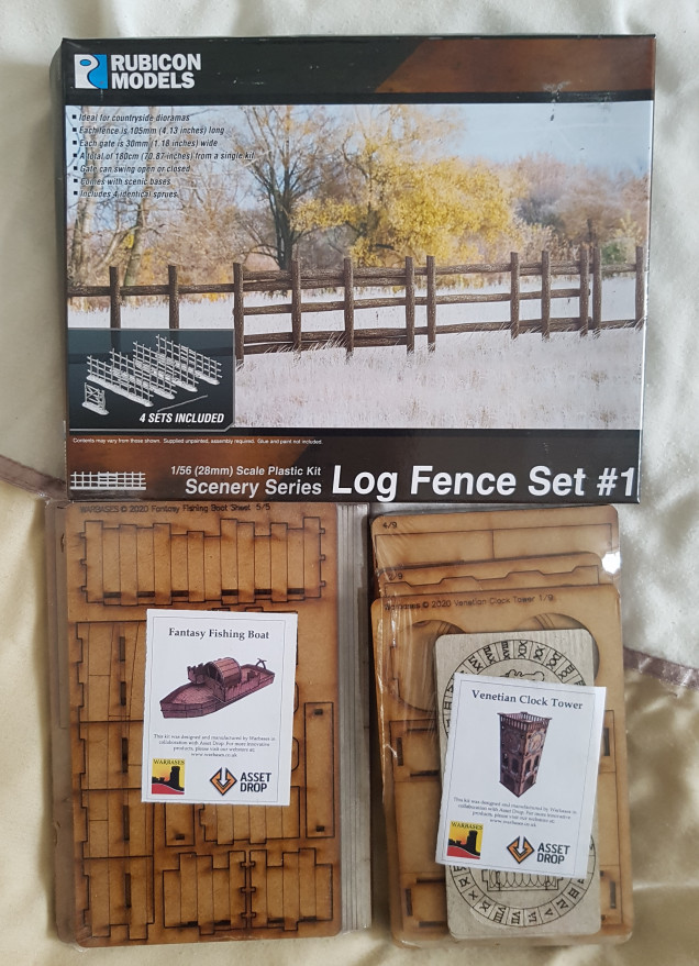 I won the Rubicon fence set from BoW a while back, along with a tank.  The two MDF kits came in Asset Drop Monster boxes.  All I really wanted was the models, not the terrain.  If anyone has any helpful guides for how to make these look good, please share me some links.