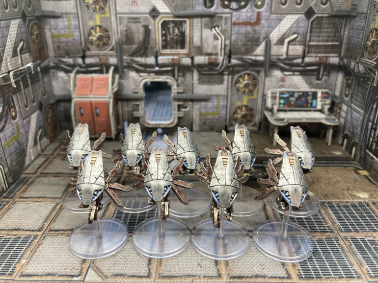 For the robotic models I painted up these Drones from Core Space First Born by Battle Systems.