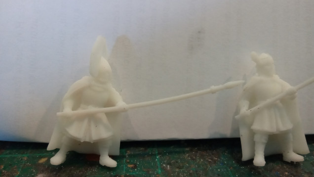  On the Left is a Fountain Court Guard with a head from a 10mm Fantasy Miniature. The Right is a counts as Citadel Guard.