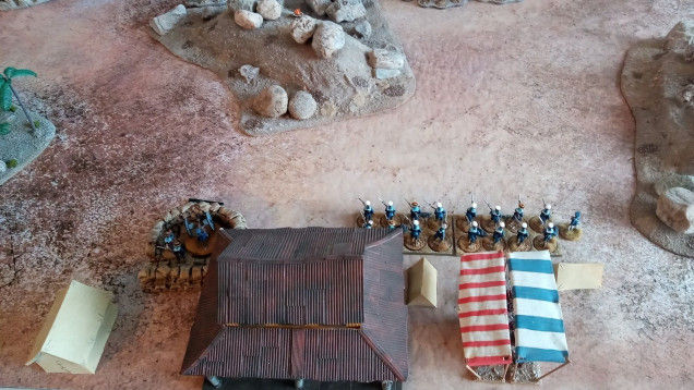 Right after this picture it all went bad. I got one burst of the Gatling Gun off and one round of shooting before a horde of Mahdists swarmed the Left Flank of Sailors, the others split to cover the gun but the Mahdists burned the trading post and massacred the garrison to a man.