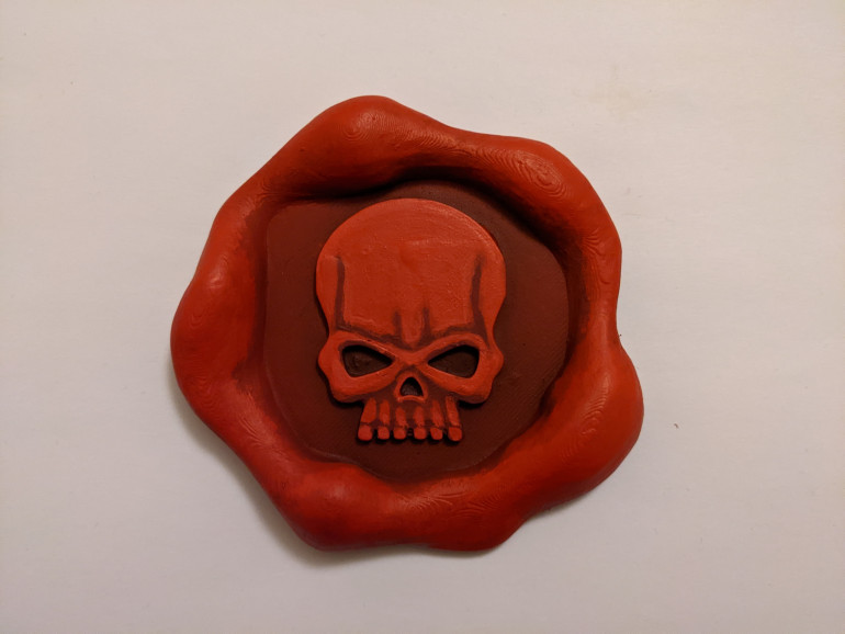 Spoldging on some red and an attempt to make the skull look groovy