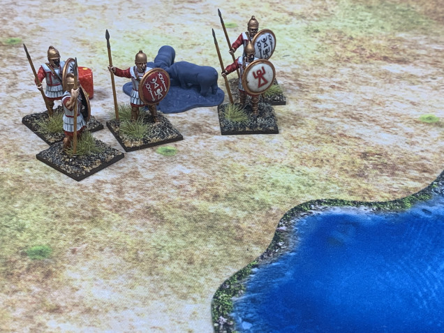 Sadly counter attacking a bigger unit with similar armor to yours is not a good idea. This photo shows where my unit used to be!  And there are those smug Carthaginians trying to decide if they want to bathe first before attacking again.