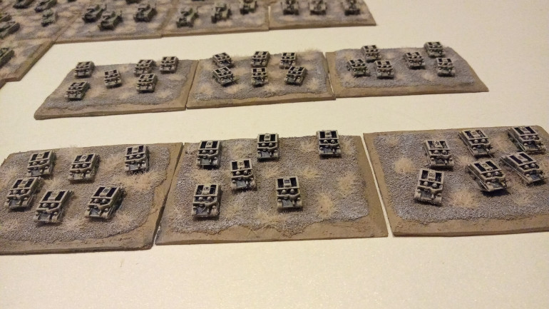 Recon Universal Carriers. Each base represents a single Carrier but scale wise each base is two sections. This is to make later Infantry easier to manage since each base can carry a platoon (2 bases/2 Squads).