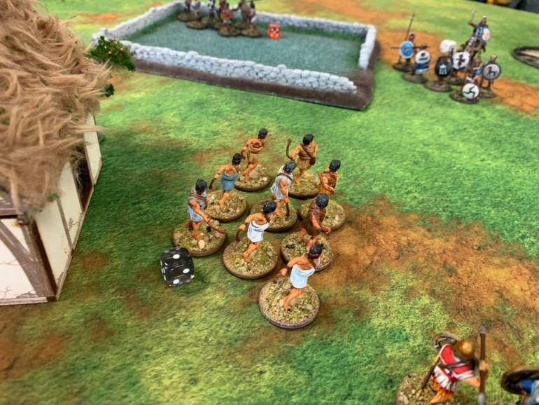 The slingers disrupt the Hoplites formation! 