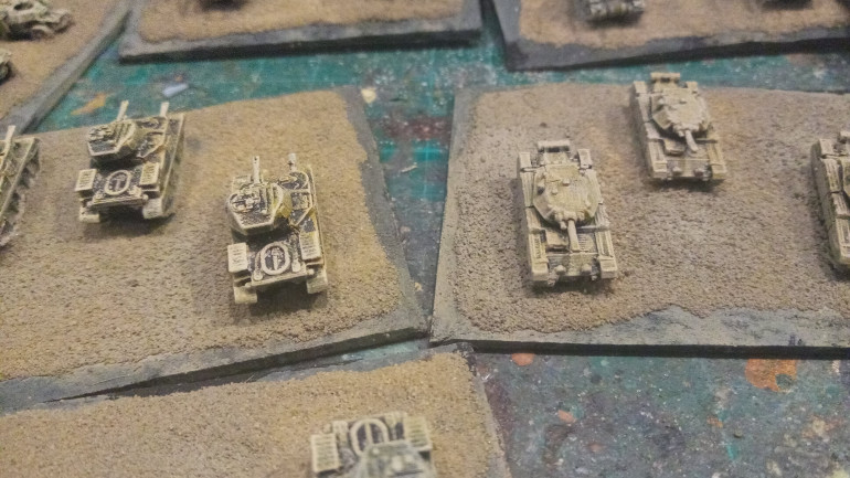 I had to change the basing scheme because the way I normally paint desert bases is the way I paint the vehicles, Desert Yellow with Skeleton Bone. I changed it to German Beige WWII and Deck Tan. This is pre drybrush.